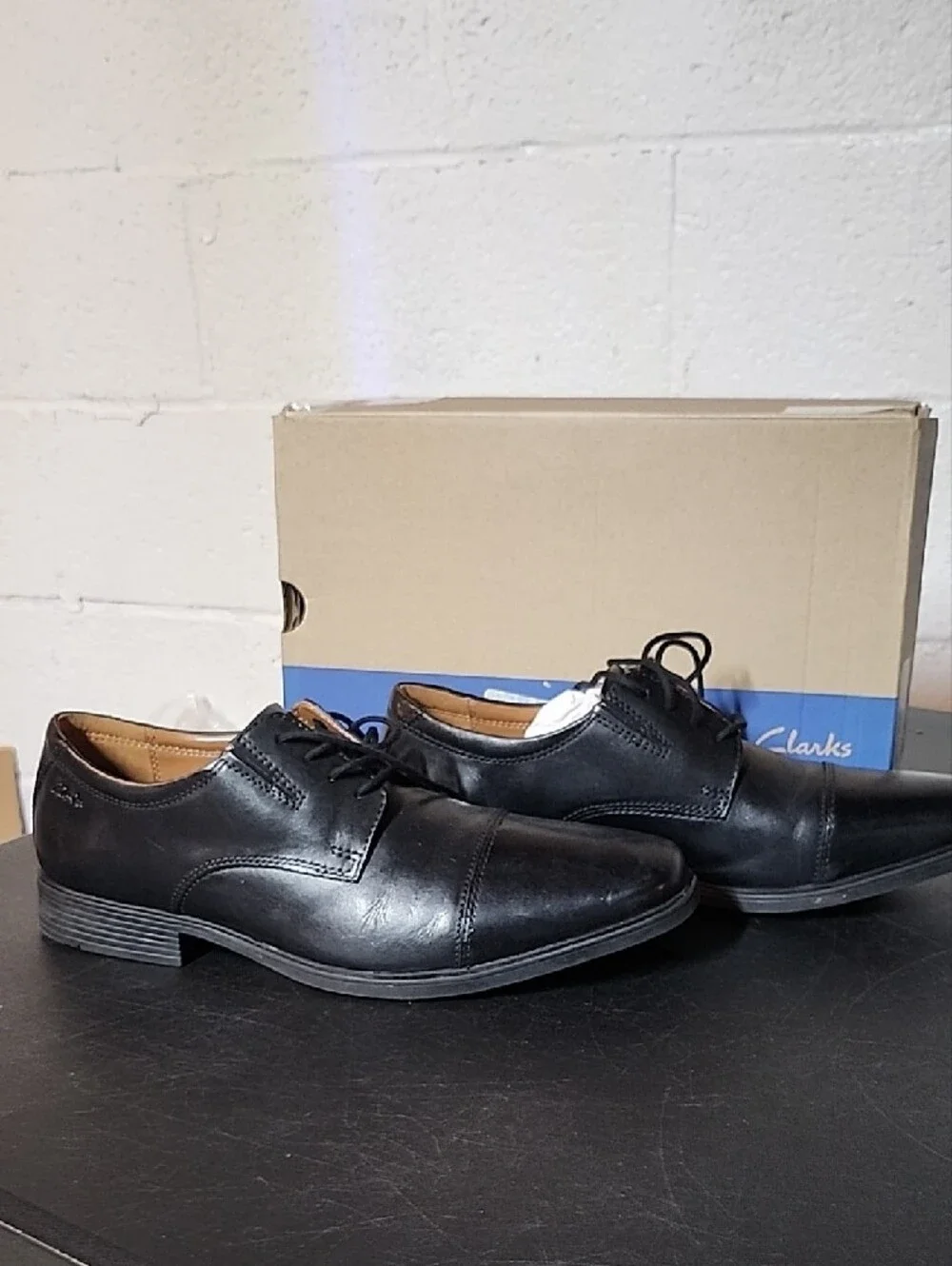 Clarks polished black